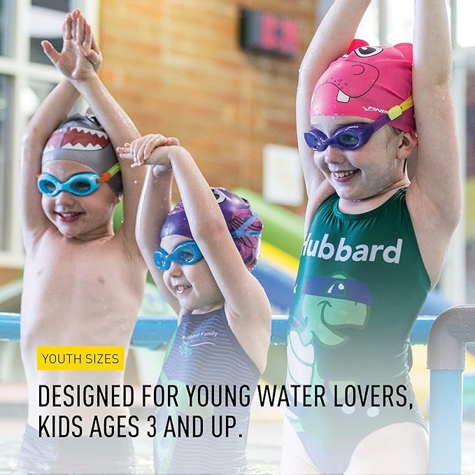 Kids wearing FINIS Animal Heads swim caps including Puffer Fish Blue, group view