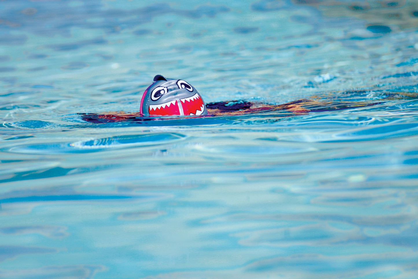 FINIS Shark swim cap in use, designed for comfort and chlorine protection