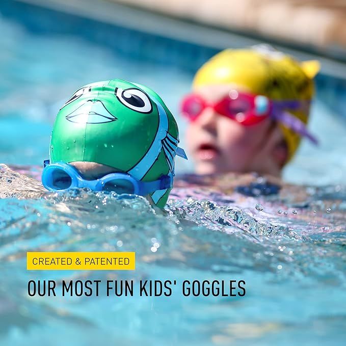 Child wearing FINIS Fruit Basket Kids' Swim Goggles in Watermelon at poolside