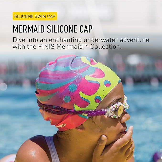 Child wearing FINIS Mermaid Silicone swim cap in Crown design