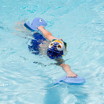 Kid enjoying water play with FINIS Whale Blue Foam Hand Floats