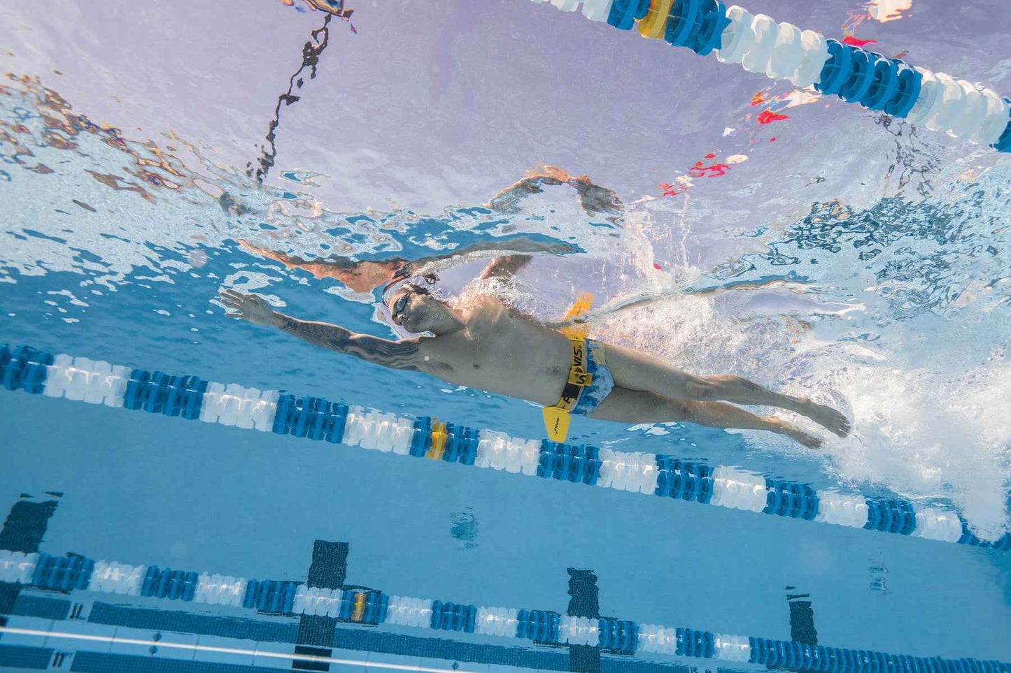 FINIS Hydro Hip in use by swimmer practising hip-driven movement in pool