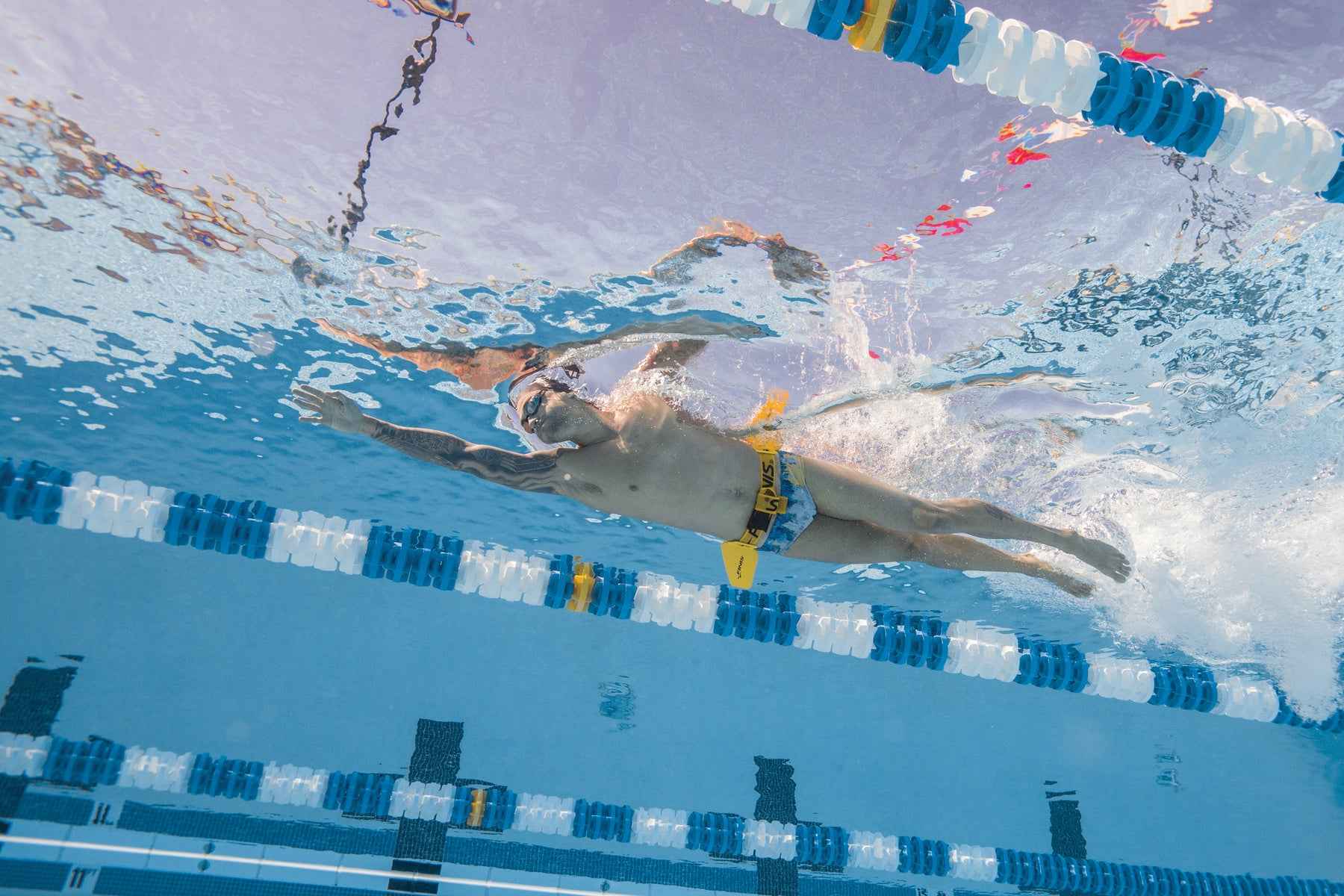 FINIS Hydro Hip in use by swimmer practising hip-driven movement in pool