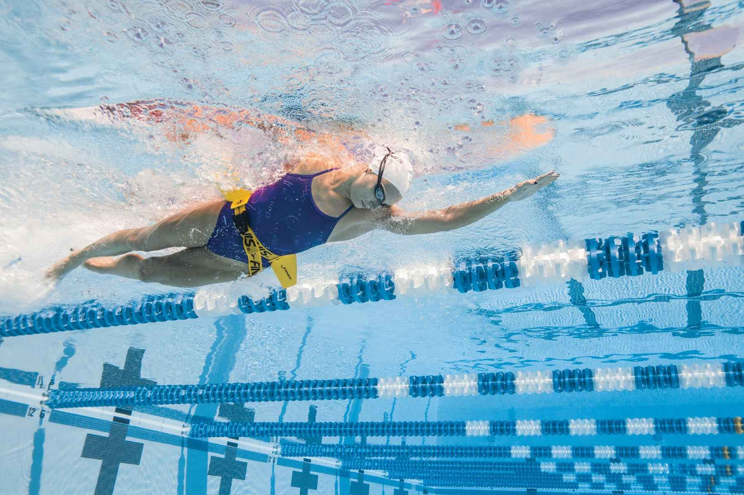 Female swimmer using FINIS Hydro Hip for core and rotation technique improvement
