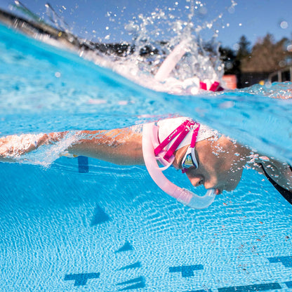 Swimmer using FINIS Stability Snorkel Orchid for technique training in pool