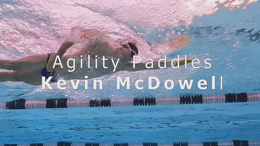 Kevin McDowell, Olympic triathlete, demonstrating and explaining FINIS Agility Paddles technique and benefits for swimmers.

